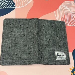 Herschel Supply Co Passport Holder Raynor Dark Gray Black Dots Red Strip Inside